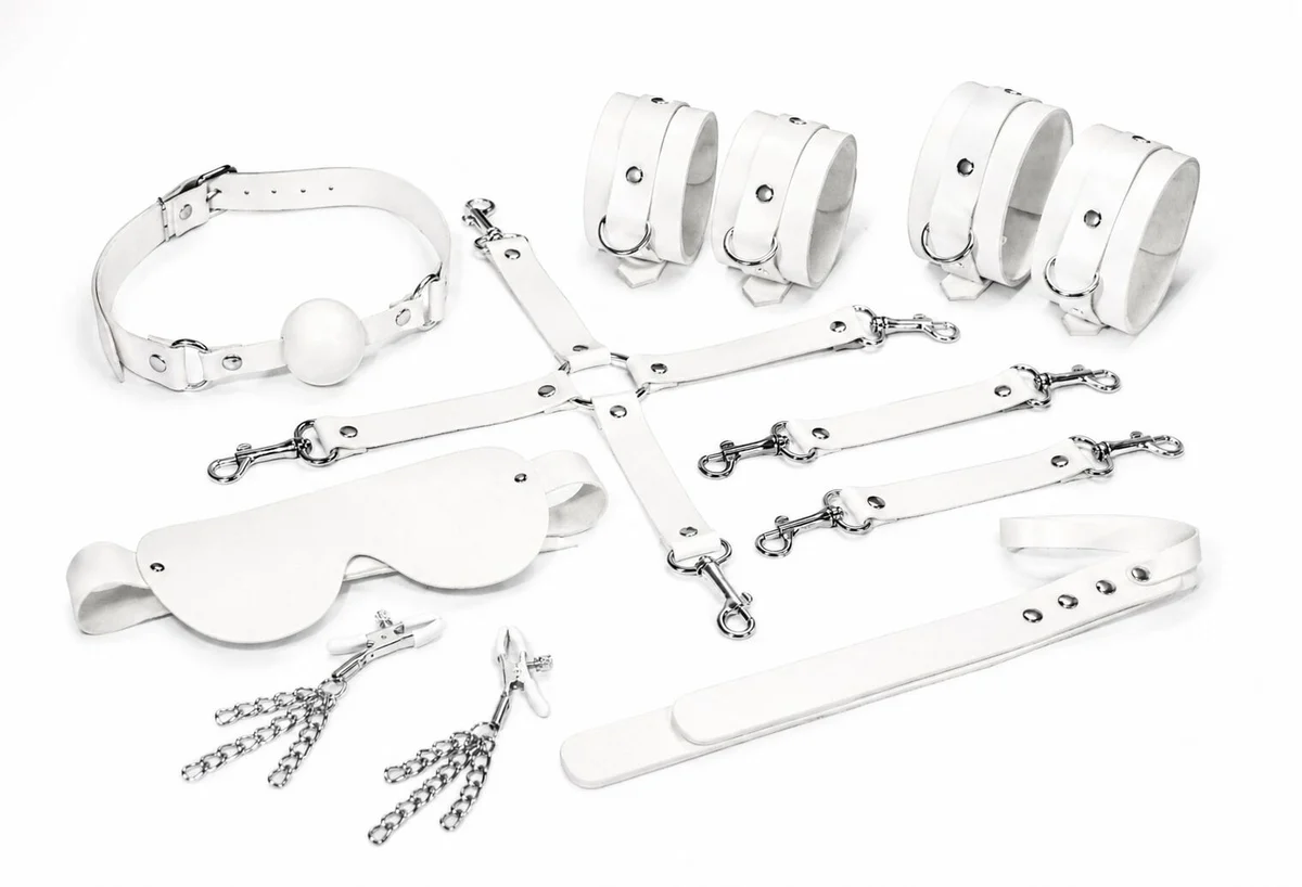 Набір Feral Feelings BDSM Kit 7 White, наручники, поножі, конектор, маска, падл, кляп, затискачі
